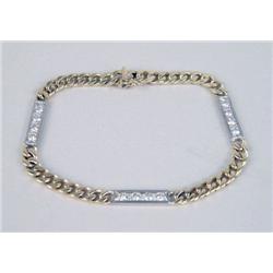 AN 18K YELLOW GOLD, WHITE GOLD AND DIAMOND BRACELET