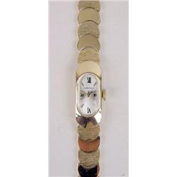 A BAUM ET MERCIER 14K YELLOW GOLD LADIES BRACELET WATCH