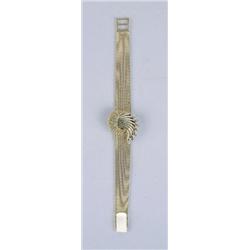 AN OMEGA 18K YELLOW GOLD AND DIAMOND LADIES COVERED BRACELET WATCH
