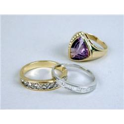 THREE 14K GOLD AND DIAMOND RINGS