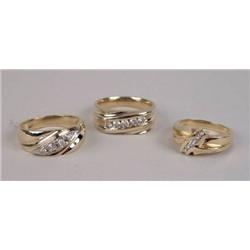 THREE 14K YELLOW GOLD AND DIAMOND RINGS