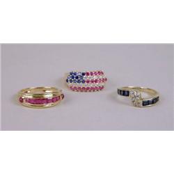 THREE 14K YELLOW GOLD RINGS