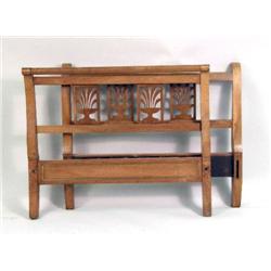 A LOUIS XVI FIGURED WALNUT SLEIGH BED