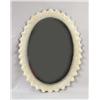 Image 2 : A PAINTED METAL SCALLOP-EDGED OVAL MIRROR