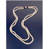 Image 1 : A SLIGHTLY GRADUATED DOUBLE-STRAND CULTURED PEARL NECKLACE