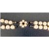 Image 2 : A SLIGHTLY GRADUATED DOUBLE-STRAND CULTURED PEARL NECKLACE