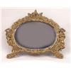 Image 2 : A GILT METAL OVAL MIRROR WITH PUTTI