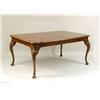 Image 1 : A GEORGIAN-STYLE WALNUT DINING TABLE