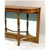 Image 2 : A REGENCY-STYLE WALNUT MIRRORED-BACK CONSOLE TABLE