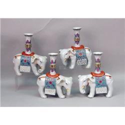FOUR MATCHING CHINESE PORCELAIN ELEPHANT CANDLESTICKS