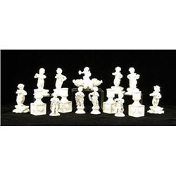 A SET OF ITALIAN CHERUB MUSICIAN-FORM SMALL VASES AND WREATHED CHERUB MENU HOLDERS