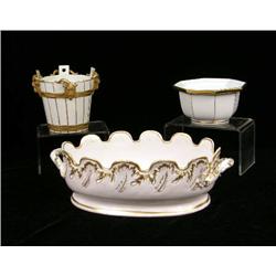 THREE PIECES OF GILT AND WHITE PORCELAIN