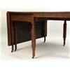 Image 4 : A PINE SWING-LEG DROP-LEAF TABLE