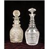 Image 1 : TWO COLORLESS CUT GLASS DECANTERS