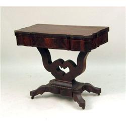 A CLASSICAL MAHOGANY GAMES TABLE