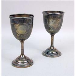 TWO ORNATE SILVER PLATED CHALICES
