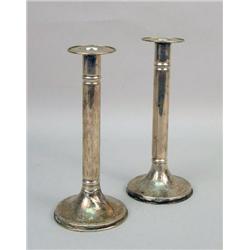 A PAIR OF GORHAM STERLING SILVER WEIGHTED CYLINDRICAL CANDLESTICKS