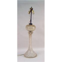 A CUT GLASS LAMP