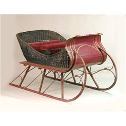 A VICTORIAN-STYLE HORSE-DRAWN SLEIGH