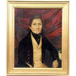 A FRAMED OIL ON CANVAS OF A WELL-DRESSED YOUNG MAN