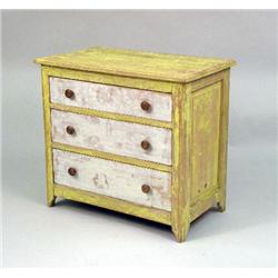 A PAINT-DISTRESSED YELLOW THREE-DRAWER PINE CHEST