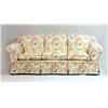 Image 1 : A CONTEMPORARY FLORAL-UPHOLSTERED COUCH