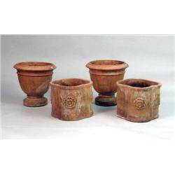 FOUR TERRACOTTA OUTDOOR PLANTERS