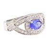 Image 1 : 1.22 ctw Oval Mixed Tanzanite And Round Brilliant Cut Diamond Ring - 14KT White