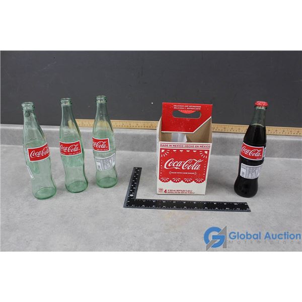 (4) Coca-Cola Bottles & Paper Caddy