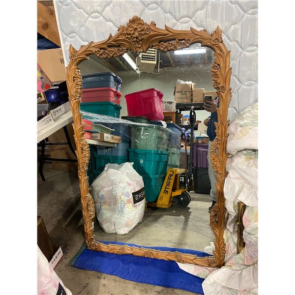 Ornate frame measures 61.5 x 33.5 inches