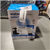 Image 1 : WATERPIK ULTRA WATER FLOSSER, WORKING