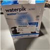 Image 3 : WATERPIK ULTRA WATER FLOSSER, WORKING