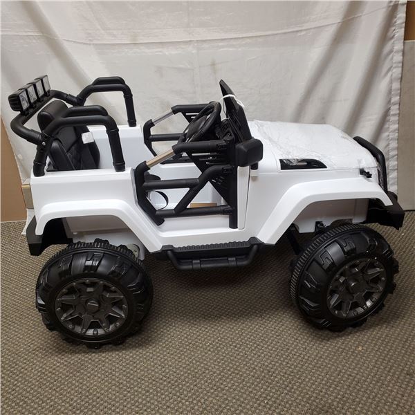 NEW WHITE KIDS RIDE ON JEEP, WITH REMOTE CONTROL AND AUDIO JACK, 12V, RETAIL $499, PRE BUILT