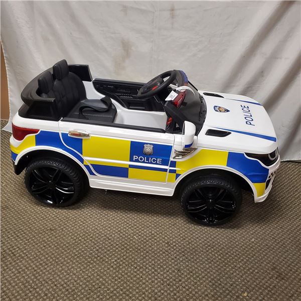 NEW KIDS RIDE ON ELECTRIC POLICE CAR, WITH LIGHTS, RETAIL $299 PRE BUILT