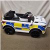 Image 1 : NEW KIDS RIDE ON ELECTRIC POLICE CAR, WITH LIGHTS, RETAIL $299 PRE BUILT