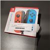 Image 1 : NINTENDO JOYCONS BLUE/RED TESTED AND WORKING