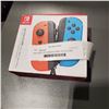 Image 1 : NINTENDO JOYCONS BLUE/RED TESTED AND WORKING