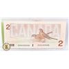 Image 2 : 7)  CANADIAN 1987 $2.00 BANKNOTE.