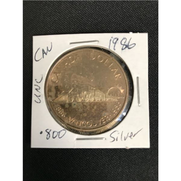 CANADIAN 1986   SILVER DOLLAR  UNCIRCULATED  .800 SILVER RAINBOW TONING