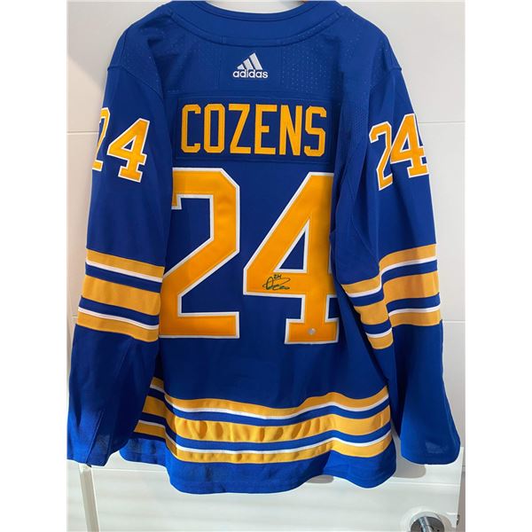 DYLAN COZENS SIGNED SABRES HOCKEY JERSEY (FRAMEWORTH COA)