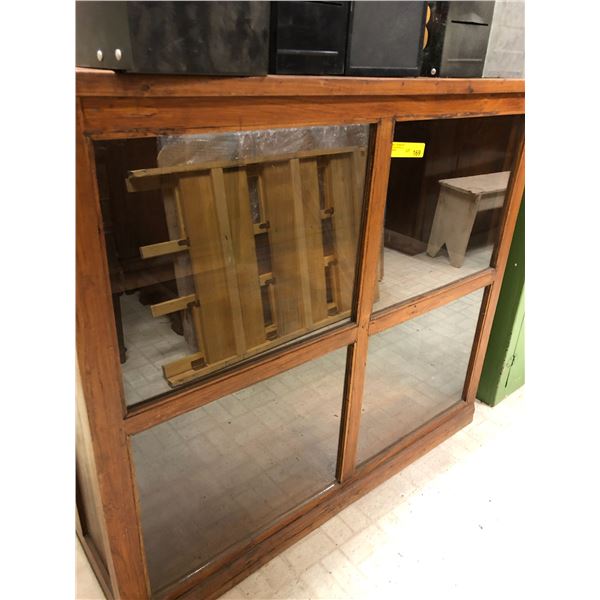 Wood and Glass Display Cabinet with sliding doors. 37In Tall