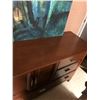 Image 2 : Large wood bedroom dresser with drawers and cupboards plus abstract art.