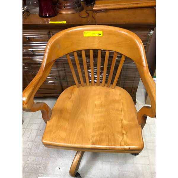 Large wood office chair on rollers - light wood.