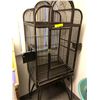 Image 1 : Black Ornate Bird Cage On Stand - 65" Tall with three feeding trays and perch from the Show