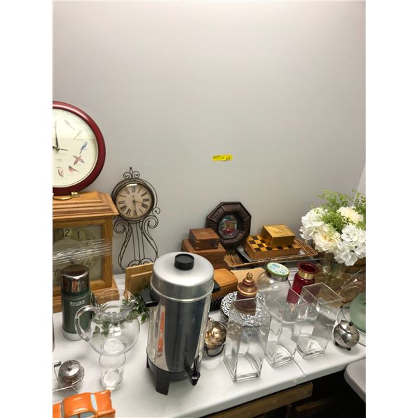 Table lot of Clocks, curio boxes, vases, pottery, trays and flowers.