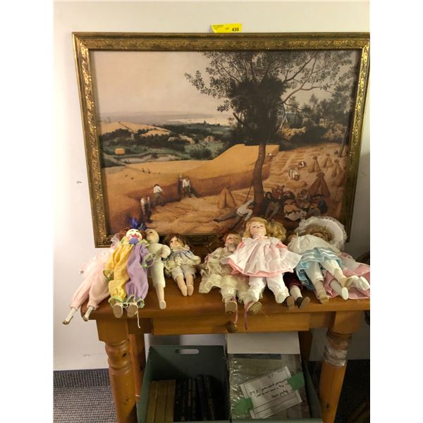 Table with collection of dolls, Ornate Picture of Works at Harvest Time, two metal bins of books and