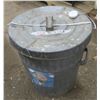 Image 1 : Metal Trash Can Full of Charcoal Briquettes