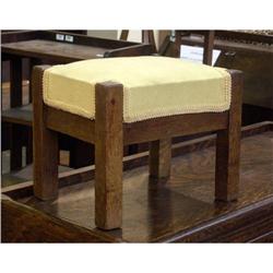 PAIR OF ARTS AND CRAFTS FOOT OAK STOOLS