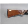 Image 2 : Remington Model 1100 Semi-Automatic Shotgun- 12ga- 27.5" Ventilated Ribbed Barrel- Engraved- Checker