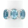 Image 1 : Platinum & 18k Gold 4.18 ctw 3 Stone Oval Aquamarine Ring w/ Round Diamond Halos